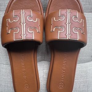 Tory Burch slide sandals.